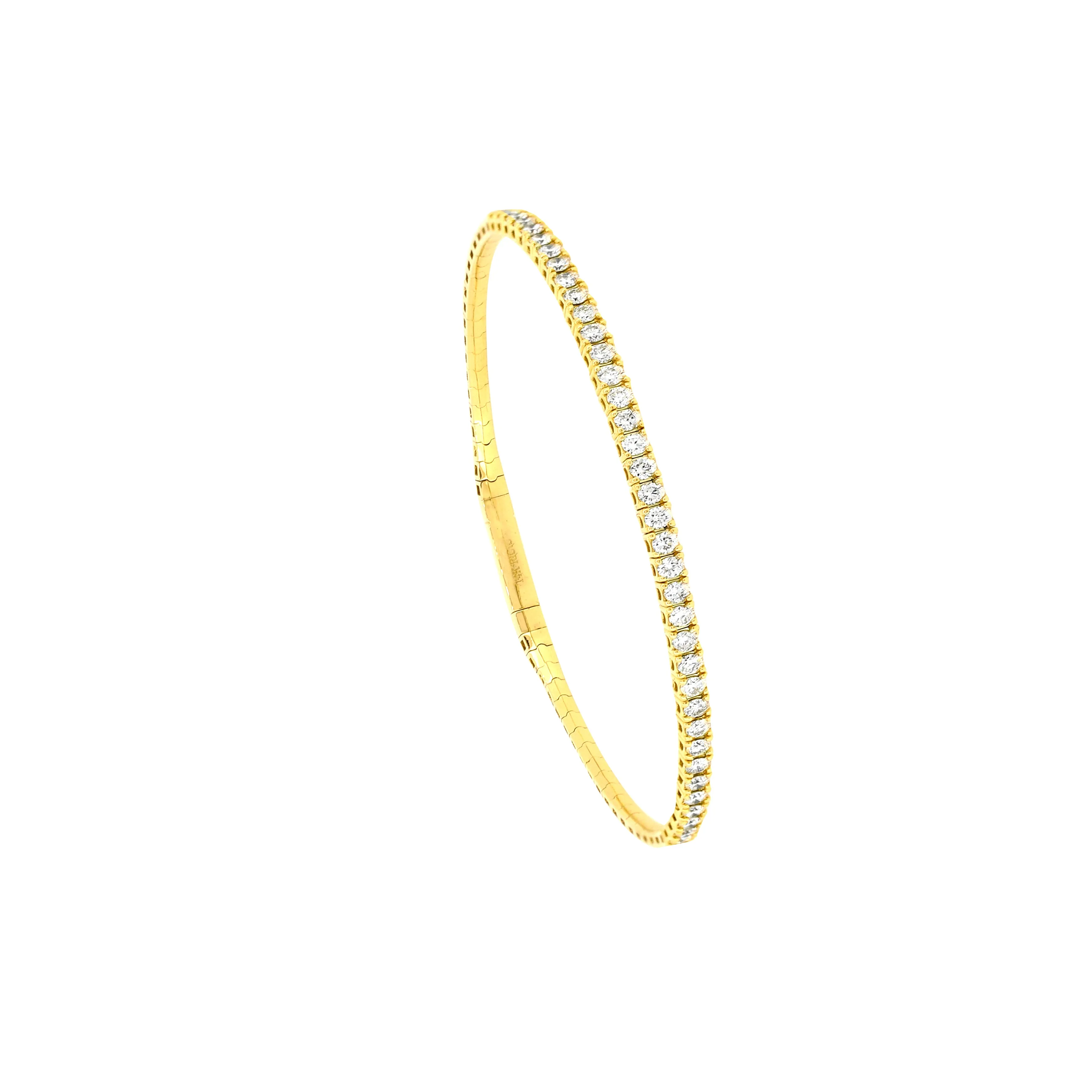 14 Karat Yellow Gold Flexible Bangle with Diamonds